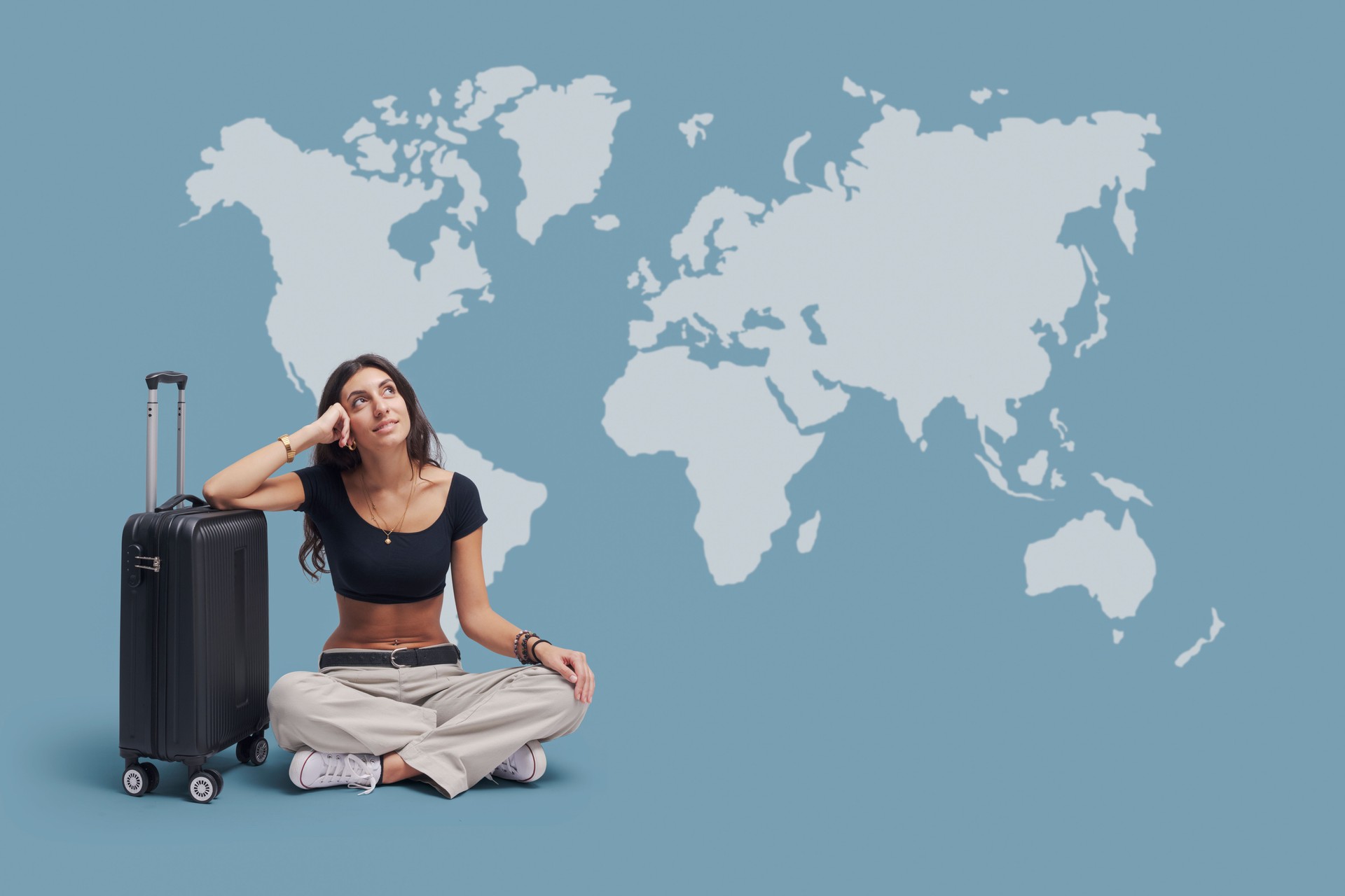 Happy woman planning her trip